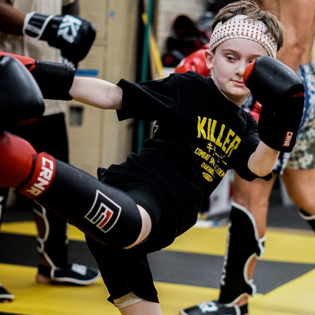 Students train MMA and grappling at Killer B Combat Academy in Oakhurst, NJ, building strength and resilience.