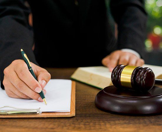 Man Writing — Lake City, FL — Lloyd E. Peterson Jr., Sandra H. Peterson, Attorneys At Law
