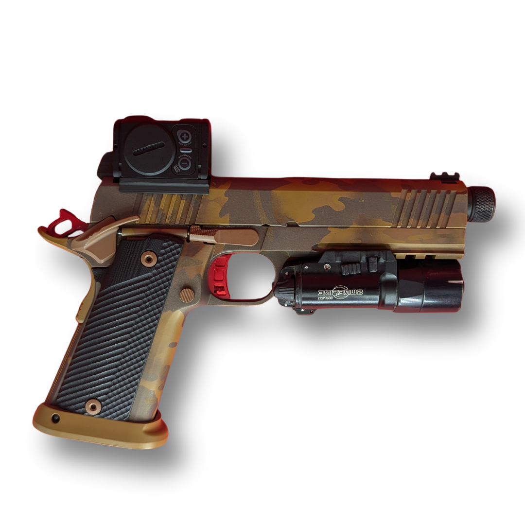 Tan-and-black handgun with a mounted sight and flashlight on a white background