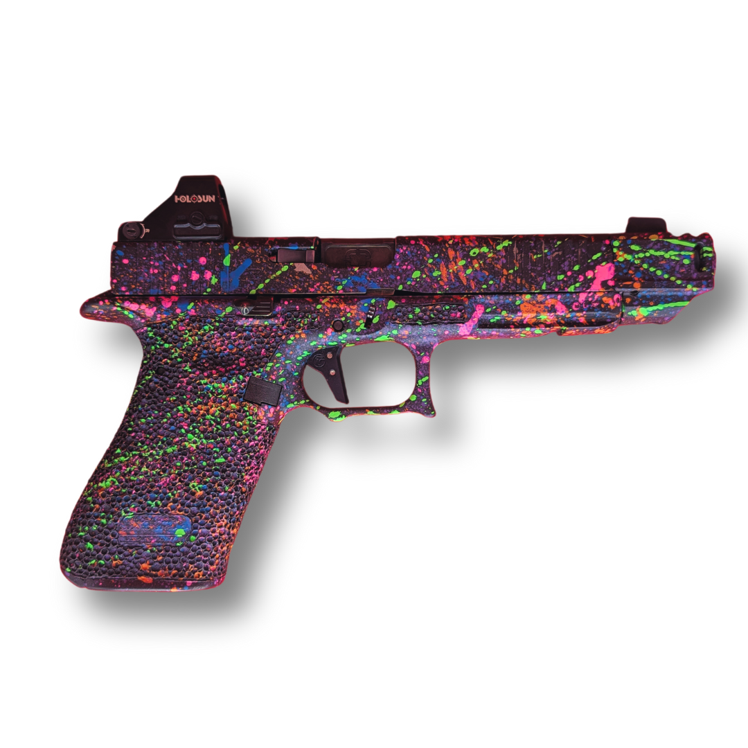 Stylized black pistol with bright multicolor speckled pattern on a white background
