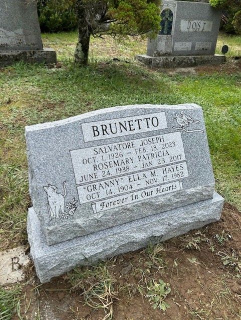Brunetto flat carved design serp top barre grey multiple names deep carved lettering single outline panel cat bird base brp sides