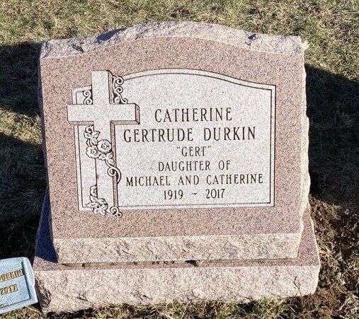 Durkin cross double outlined panel base serp top floral design deep carved lettering brp sides