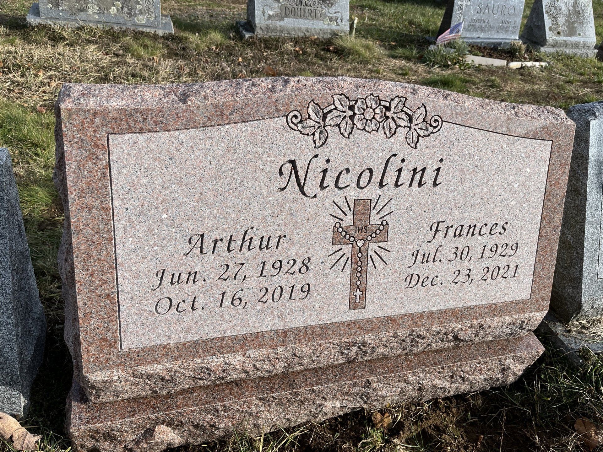 Nicolini deep carved lettering shape carved design single outlined panel serp top base north american pink multiple names cross in glory brp sides