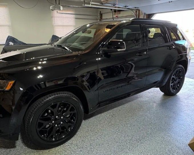 Black SUV with window tint by CM3 Detailing Studio & Ceramic Coating in Elgin, IL