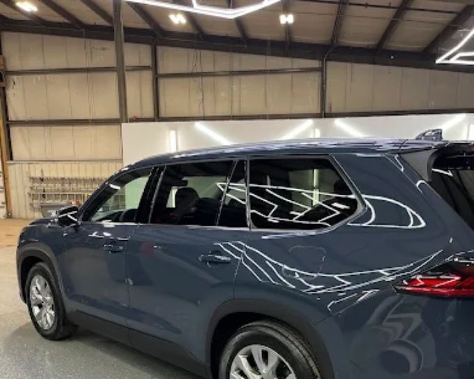 Dark SUV during window tint installation at CM3 Detailing Studio & Ceramic Coating in Elgin, IL