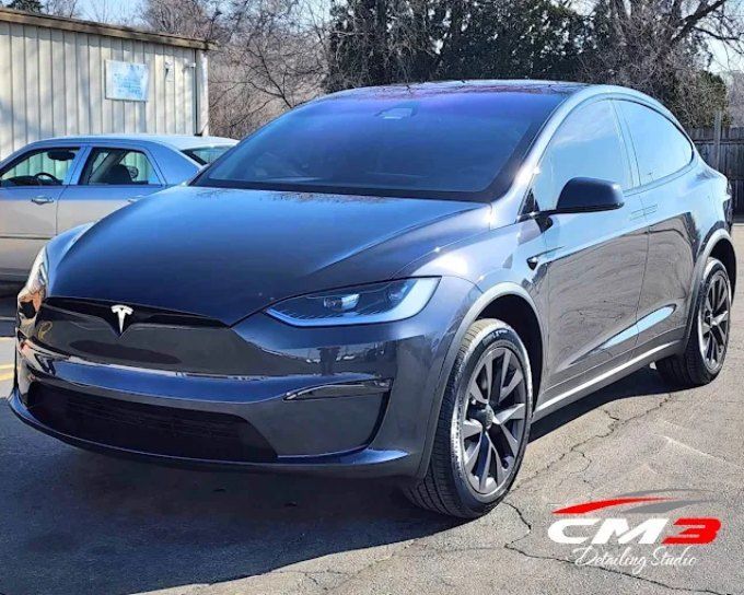 Dark gray SUV with window tint by CM3 Detailing Studio & Ceramic Coating in Elgin, IL
