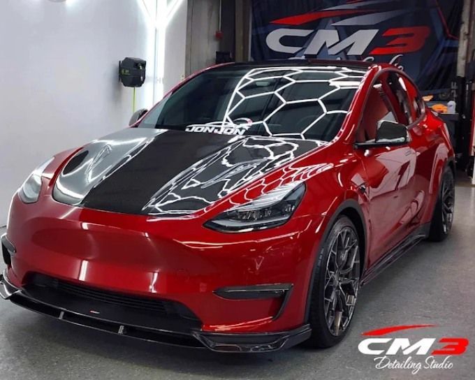 Red SUV with ceramic coating by CM3 Detailing Studio & Ceramic Coating in Elgin, IL
