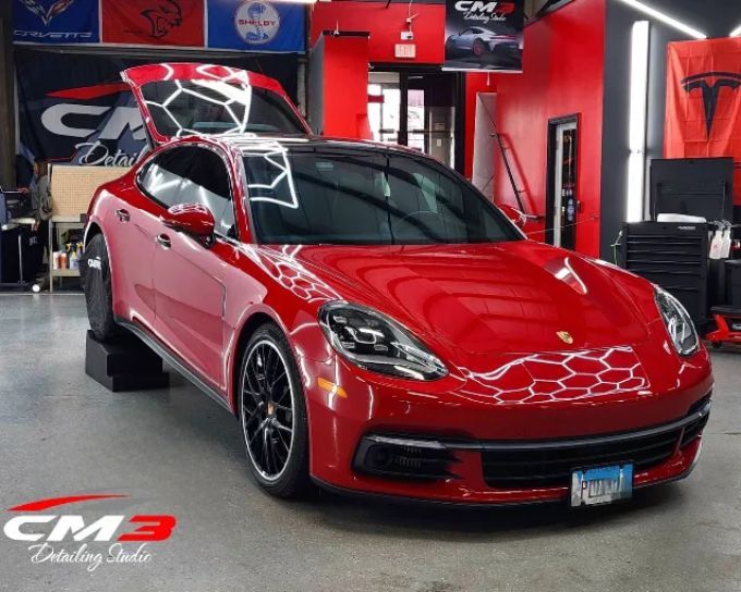 Red sports car with PPF by CM3 Detailing Studio & Ceramic Coating in Elgin, IL