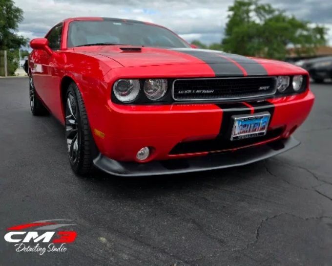 Red coupe with paint protection film by CM3 Detailing Studio & Ceramic Coating in Elgin, IL