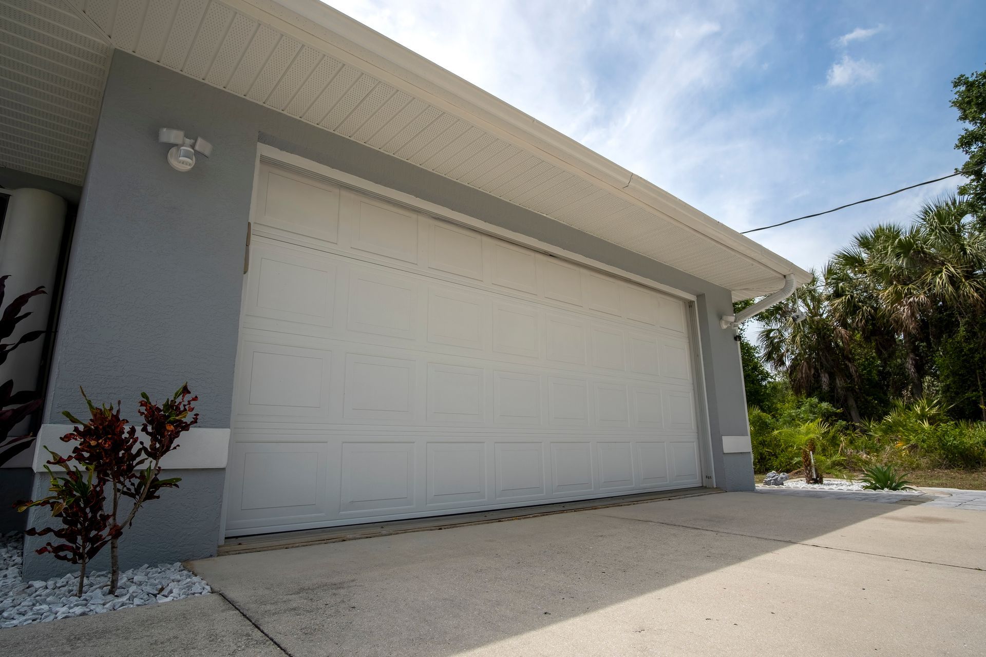 Grey House with White Garage Door — Dearborn, MI — Doors Are Us