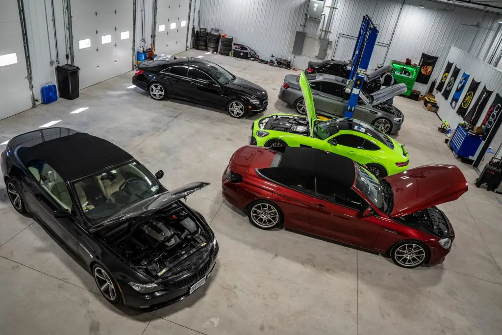 Cars parked in garage with hoods up | Eurocharged