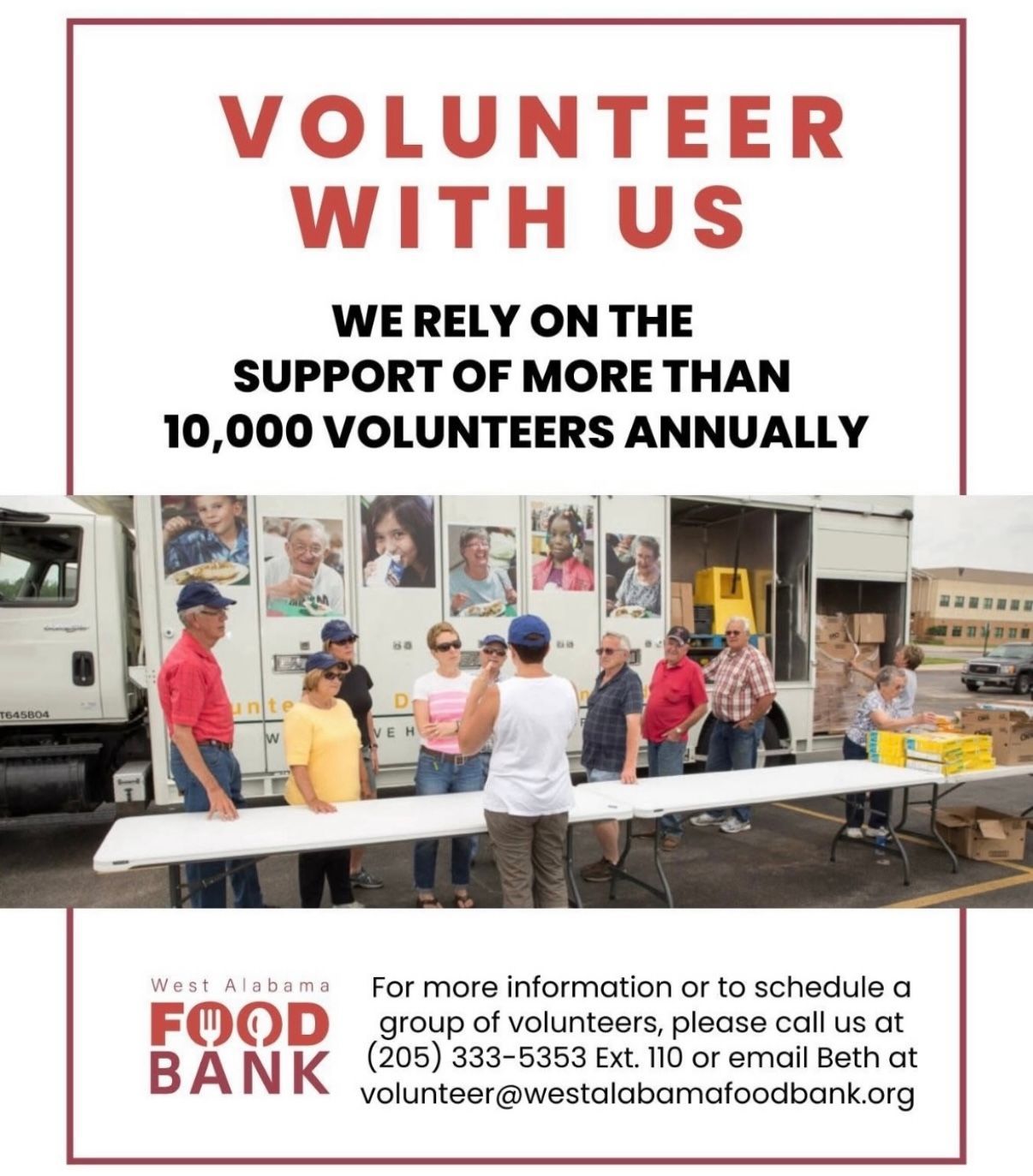 Volunteers serving food at a food bank with 