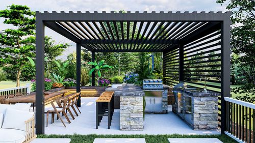 Modern outdoor patio with black pergola, stone grill area, and wooden dining tables in a landscaped yard