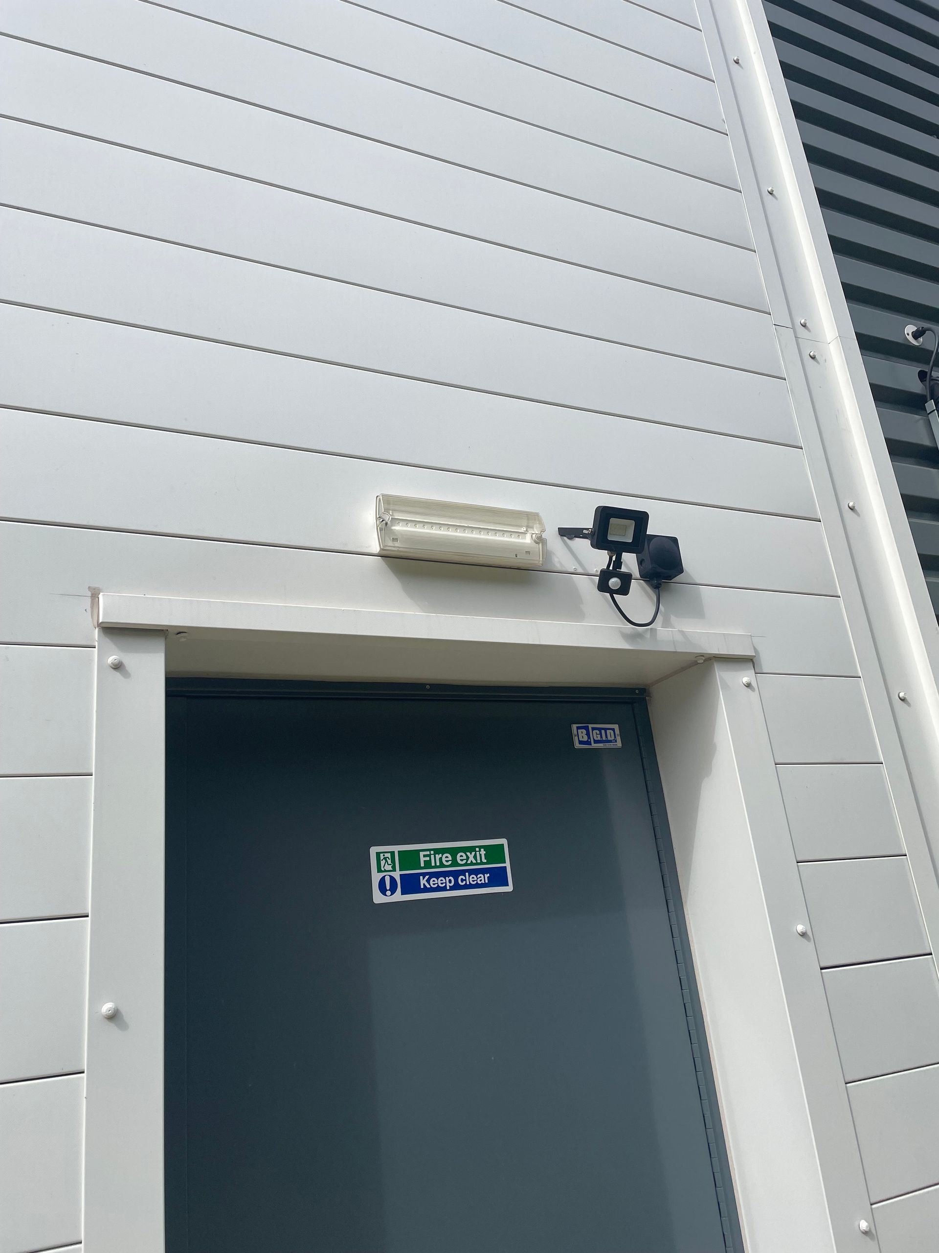 External Security Light+Emergency Light Above Fire Exit Door