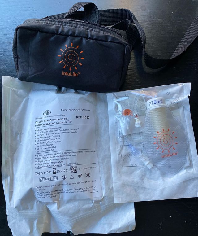 InfuLife® carry pouch with a packaged FMS double-site anesthesia kit (REF YC50) and a packaged InfuLife® 270 mL pump