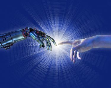 Human and robotic hands reaching toward each other against a blue, glowing background