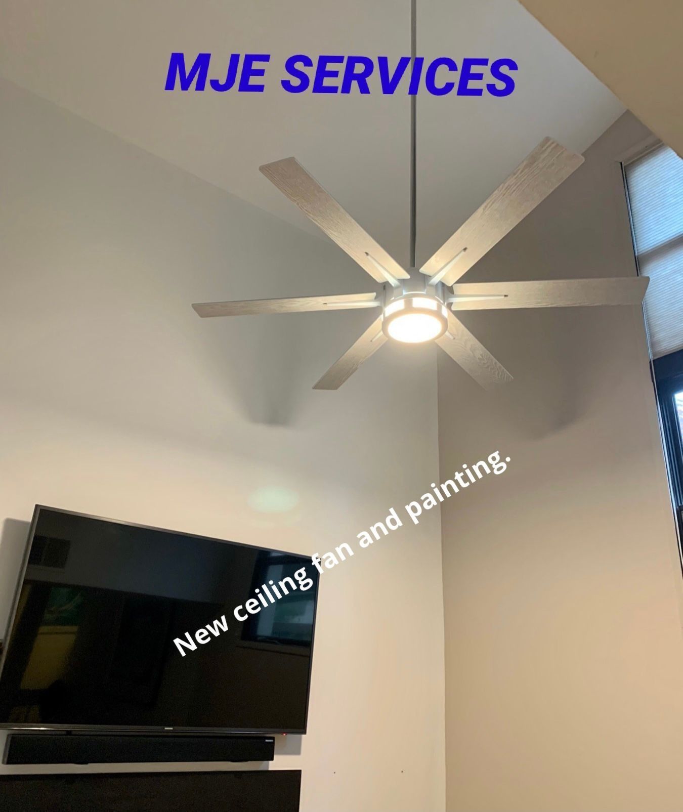 Ceiling fan and wall-mounted TV in a bright room with “MJE SERVICES” text overlay.