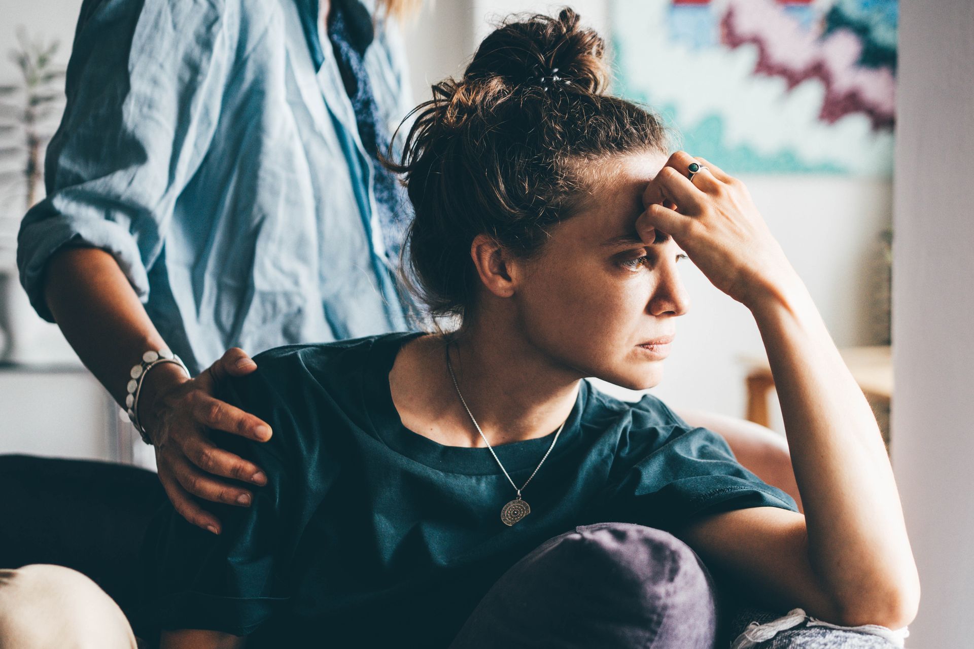 Depressed man leaning his head against a wall — Mental Health Condition Treatment in Pittsburgh, PA