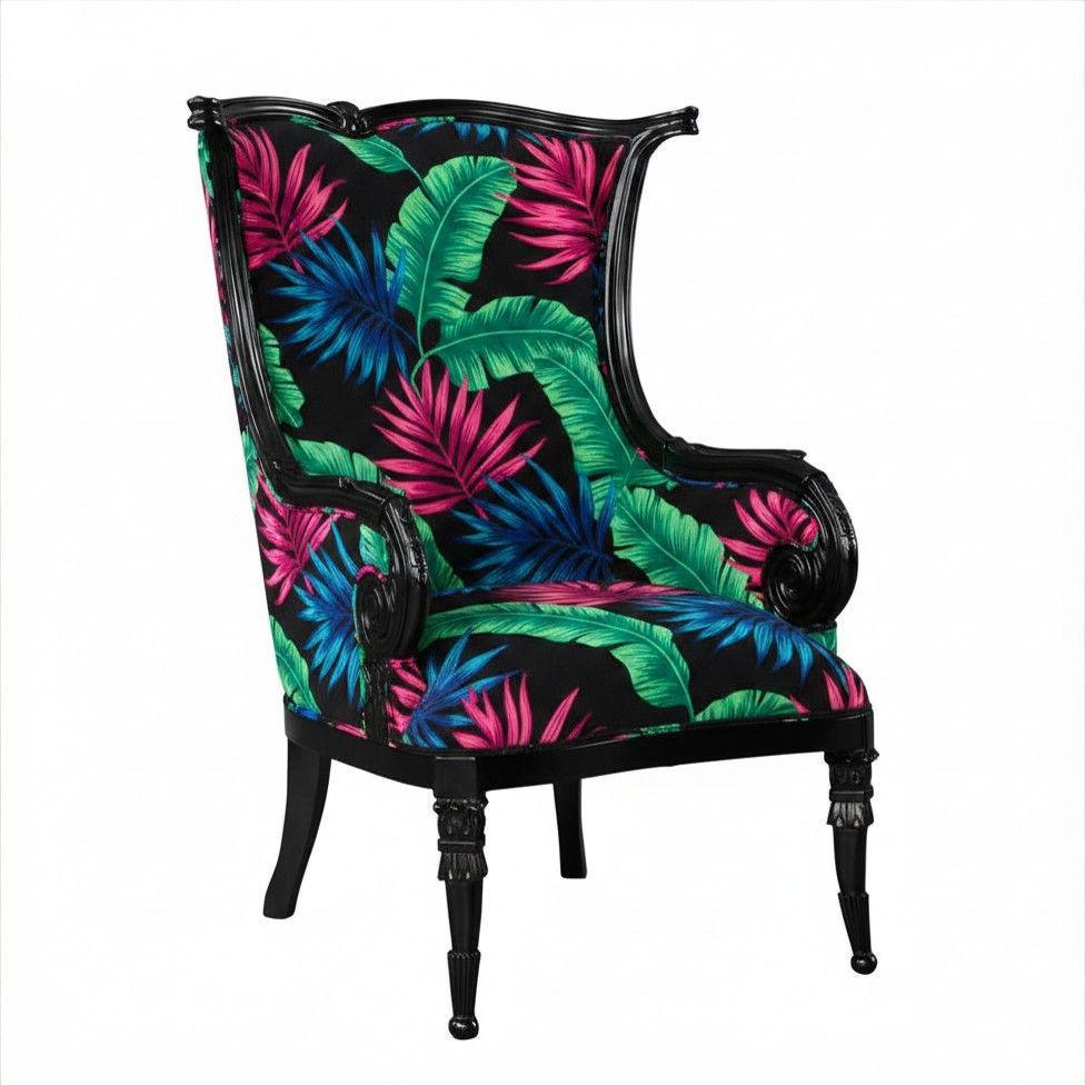 Colorful tropical-print upholstered chair with black legs and a right-side armrest on a white background