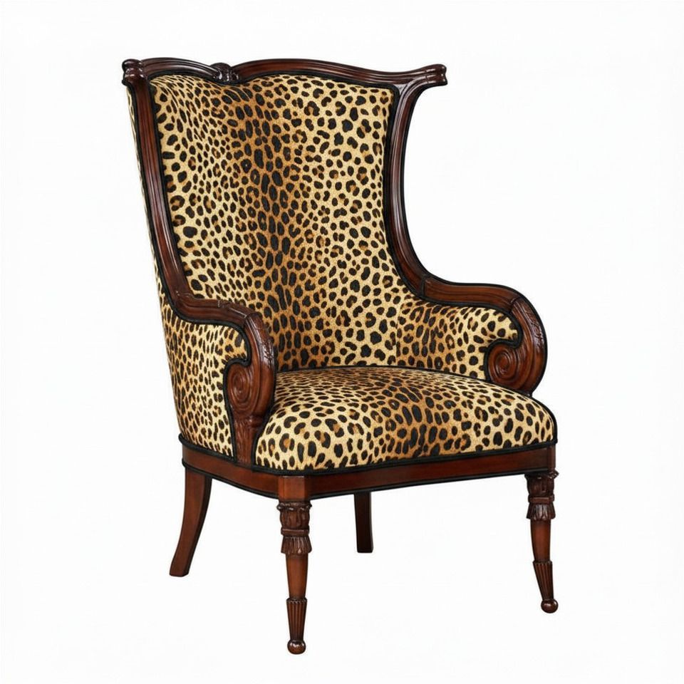 Leopard-print upholstered wingback chair with carved dark wood frame and legs