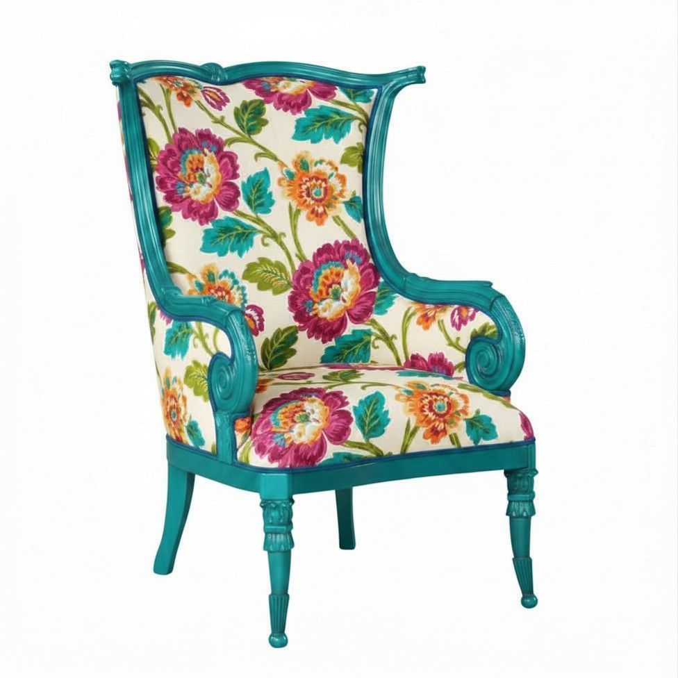 Turquoise wingback chair with vibrant floral upholstery and carved arms, isolated on white background