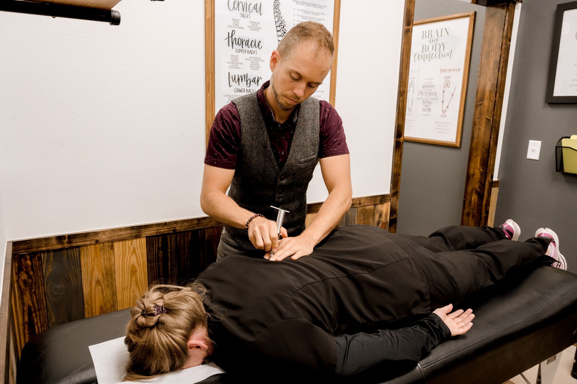 Dr. Lee Horine massaging a client