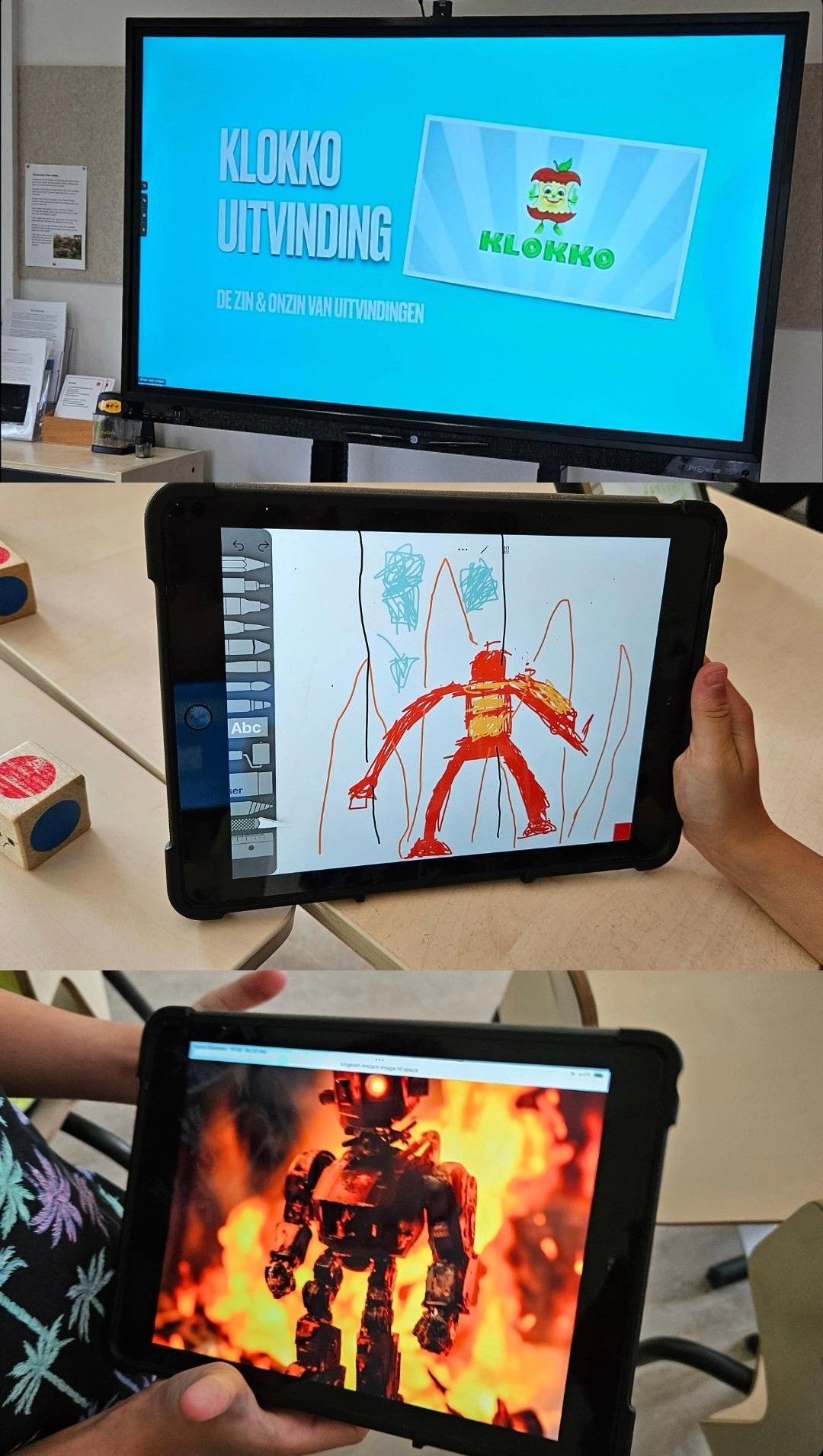 Tablets tonen een geanimeerde robot, het scherm toont het spellogo.