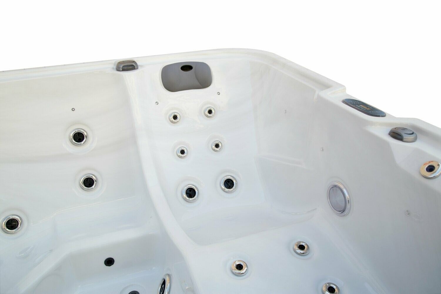 White hot tub interior with multiple jet nozzles.