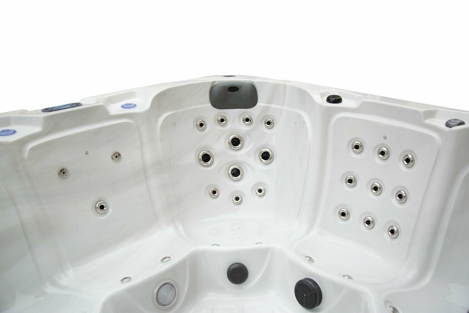 Interior view of a white hot tub with multiple jets, showing the seating area and control panel.