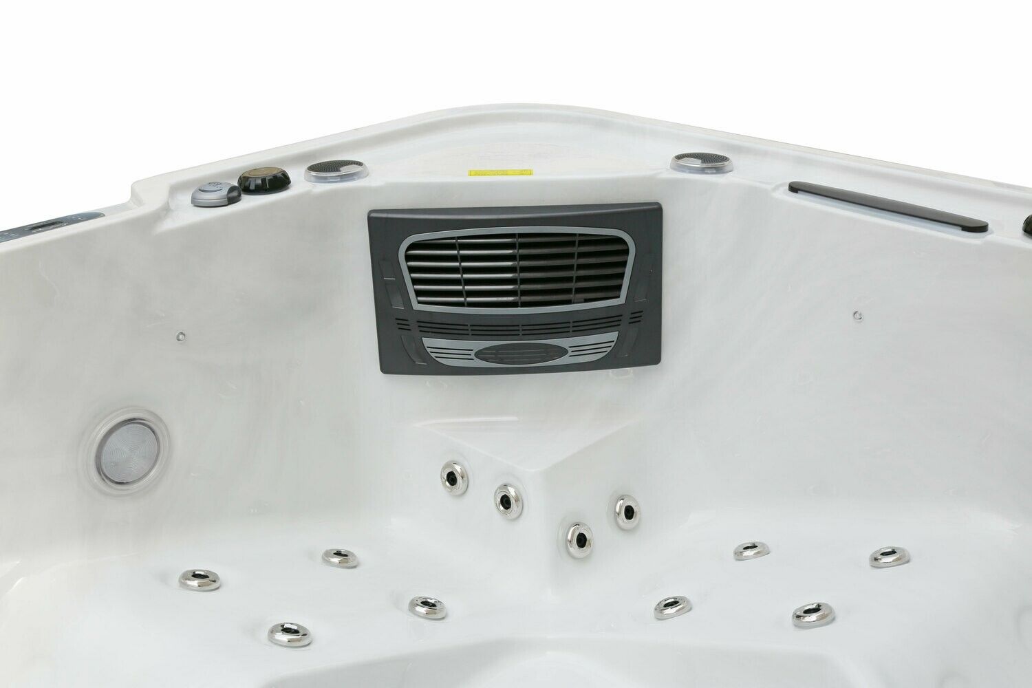 Interior view of a white hot tub with multiple water jets and a vent.