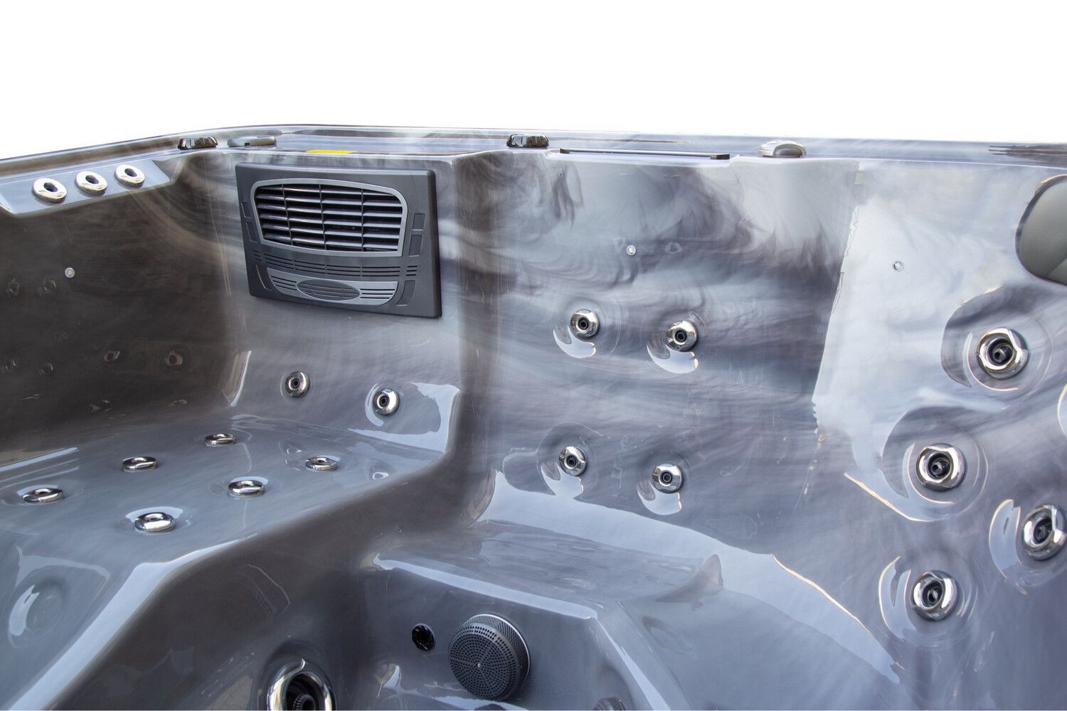 Close-up of a gray hot tub interior with jets and a vent against a marbled finish.