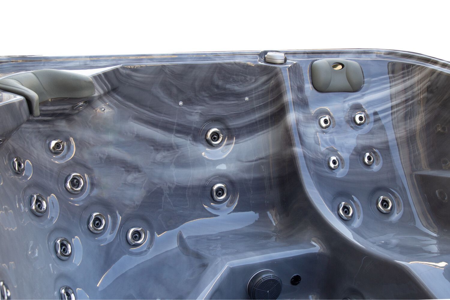 Gray marbled hot tub interior with several jets.