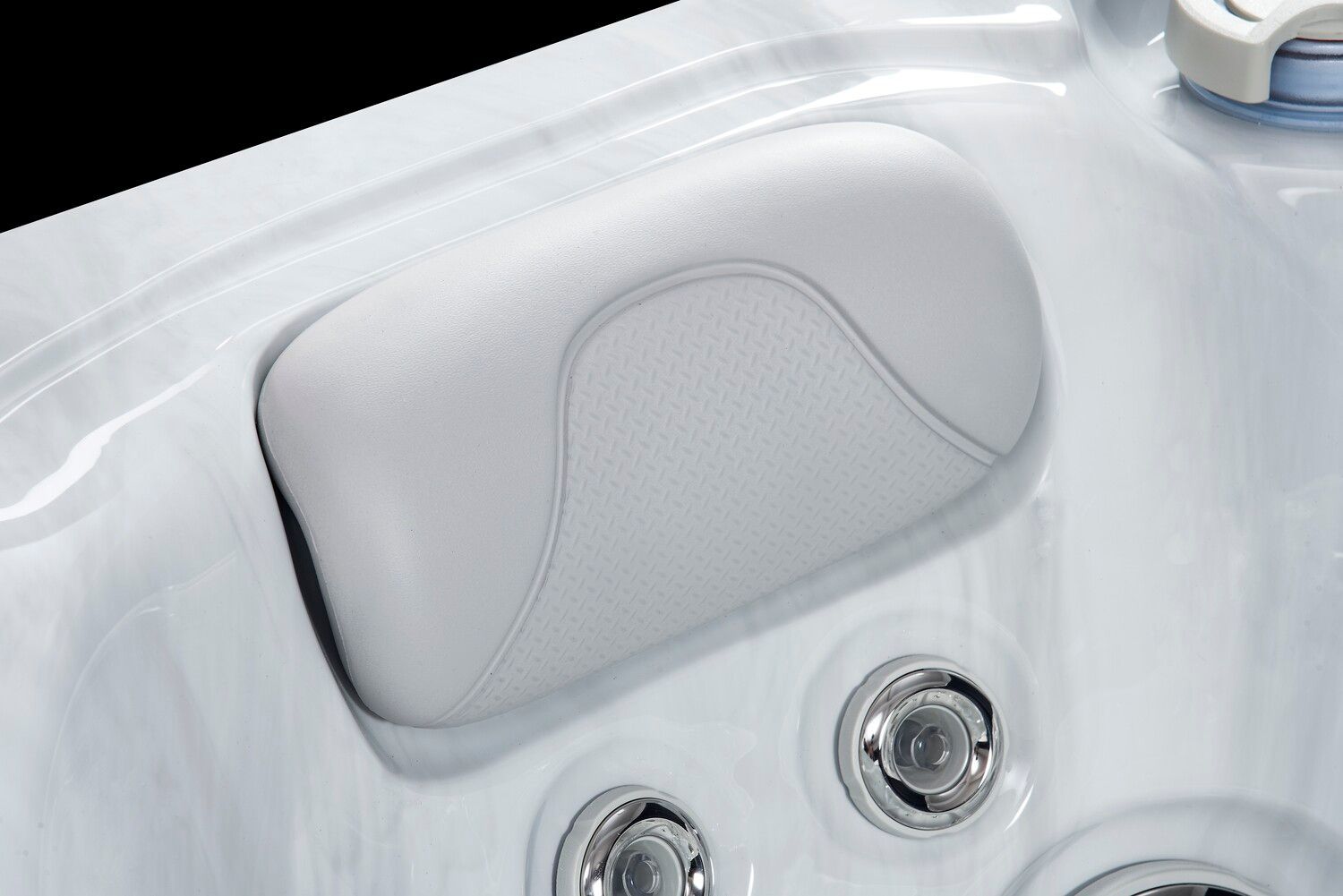 White spa pillow in a hot tub, close-up view.