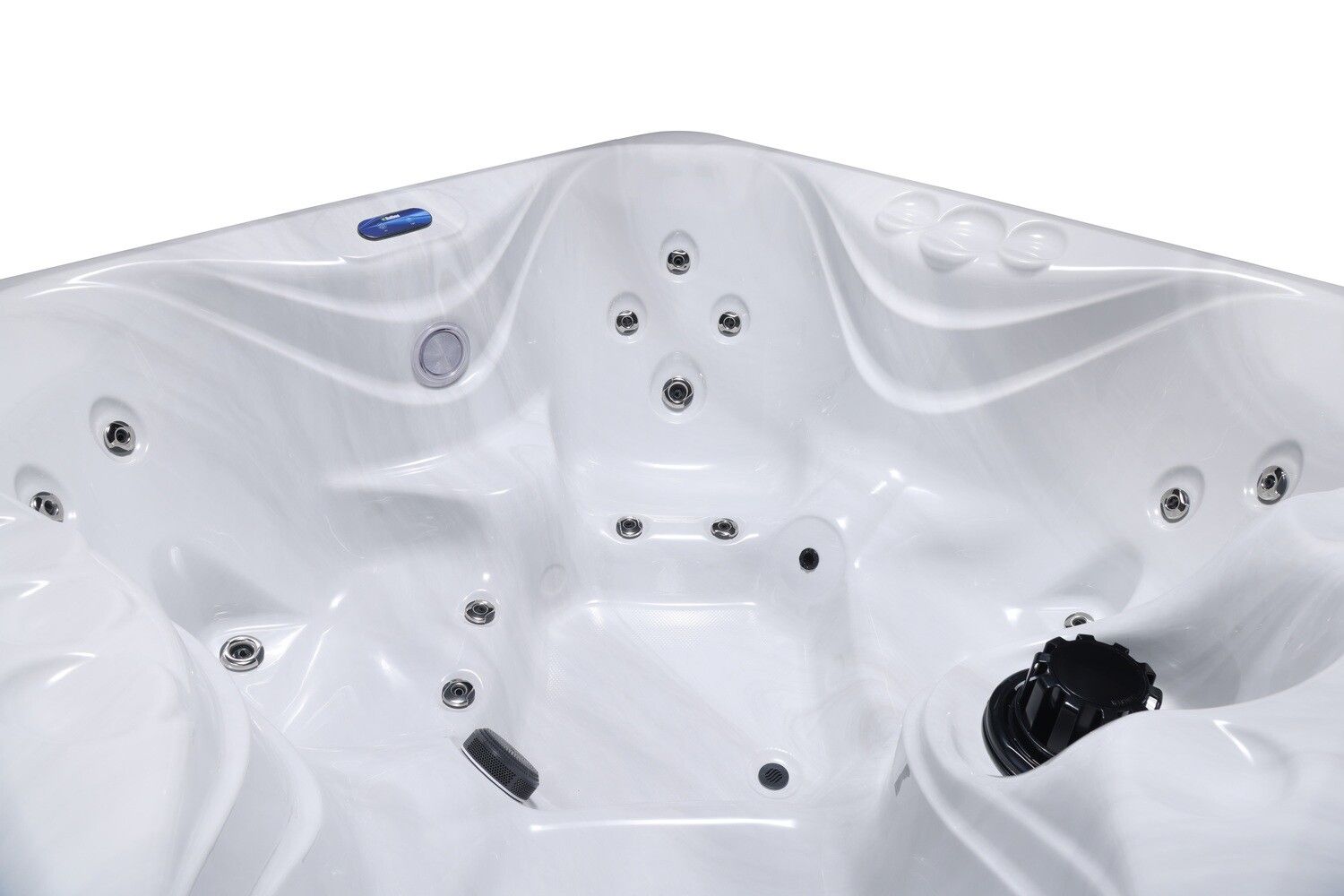 White hot tub interior with multiple water jets and controls.