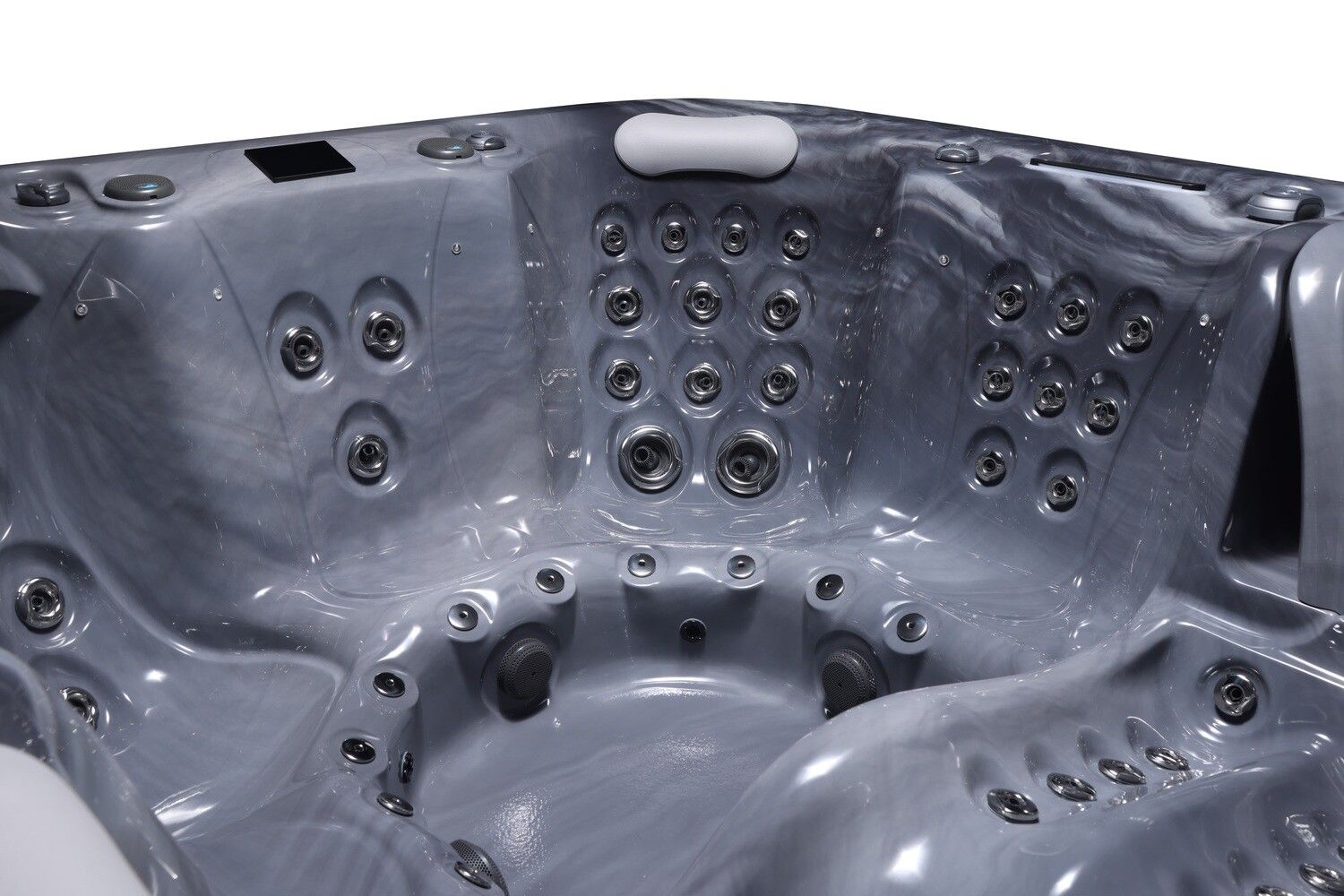 Gray and white hot tub interior with multiple jets.