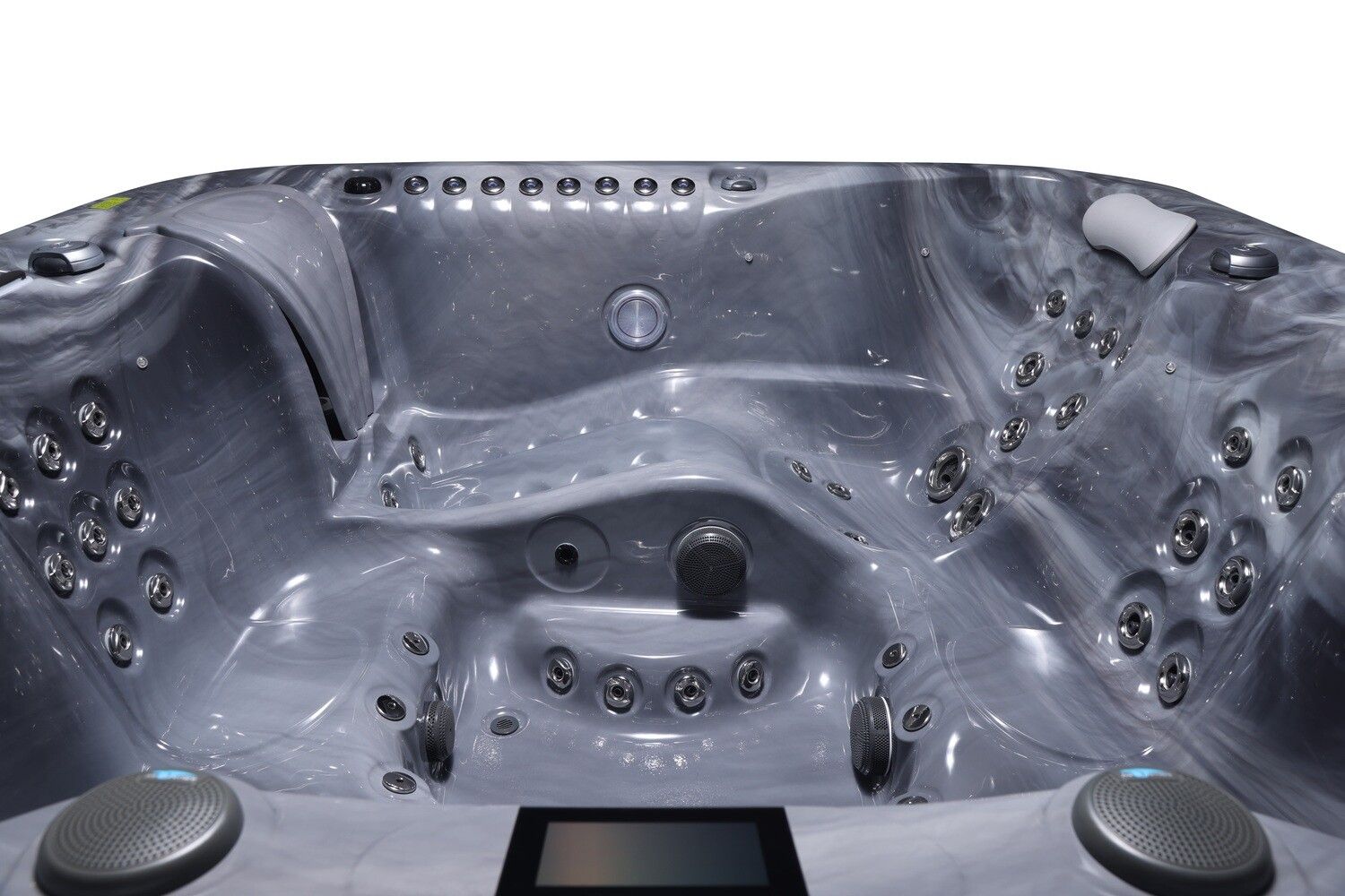 Interior of a gray hot tub with multiple jets, control panel, and speakers.