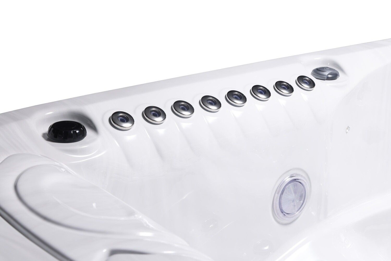 White hot tub interior with several water jets.