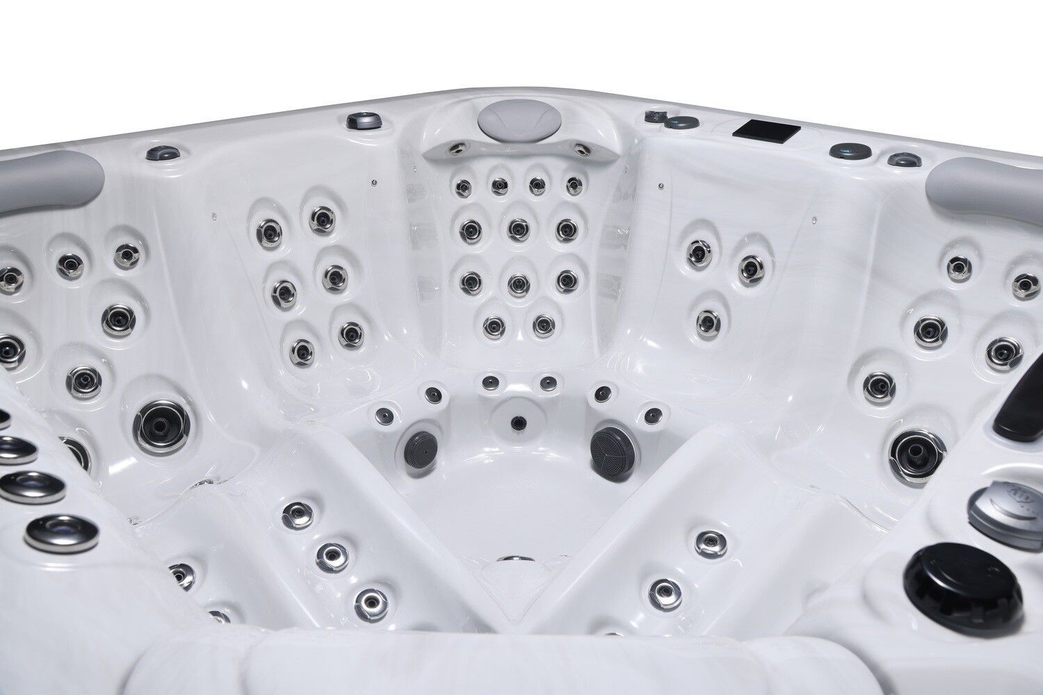 White hot tub interior with numerous jets.