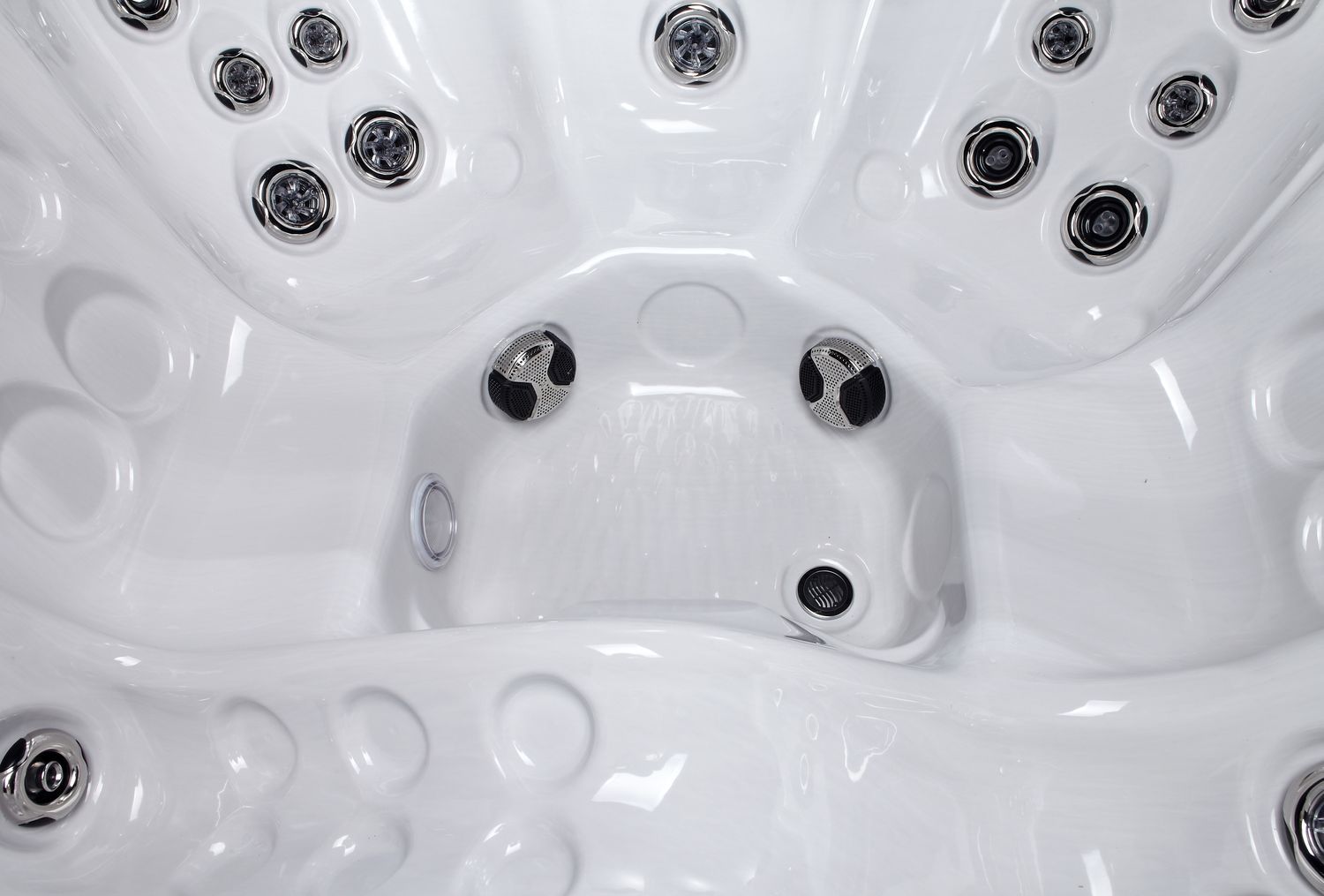 White hot tub interior with several jets.