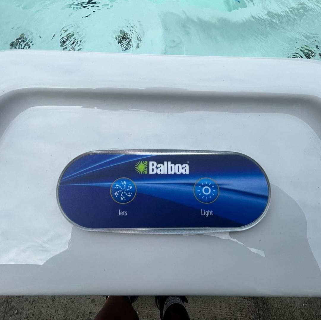 A Balboa hot tub control panel with Jets and Light buttons.