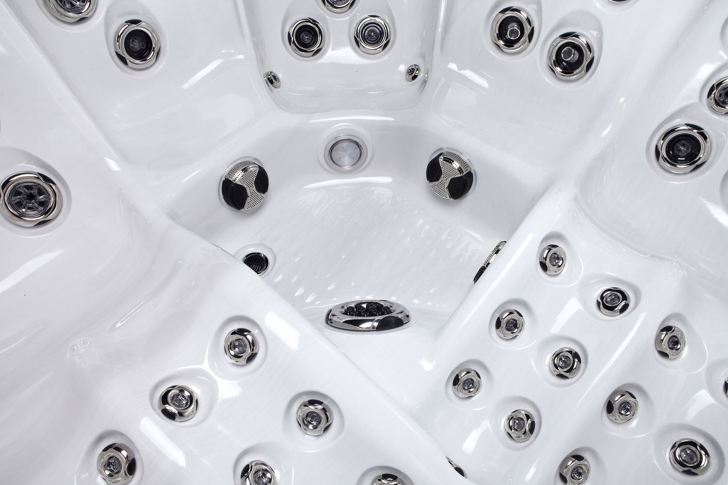 White hot tub interior with numerous jets.