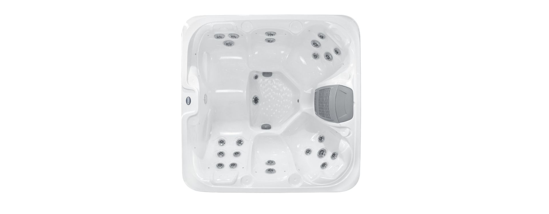 Overhead view of a white rectangular hot tub with various jet placements, and a gray headrest.