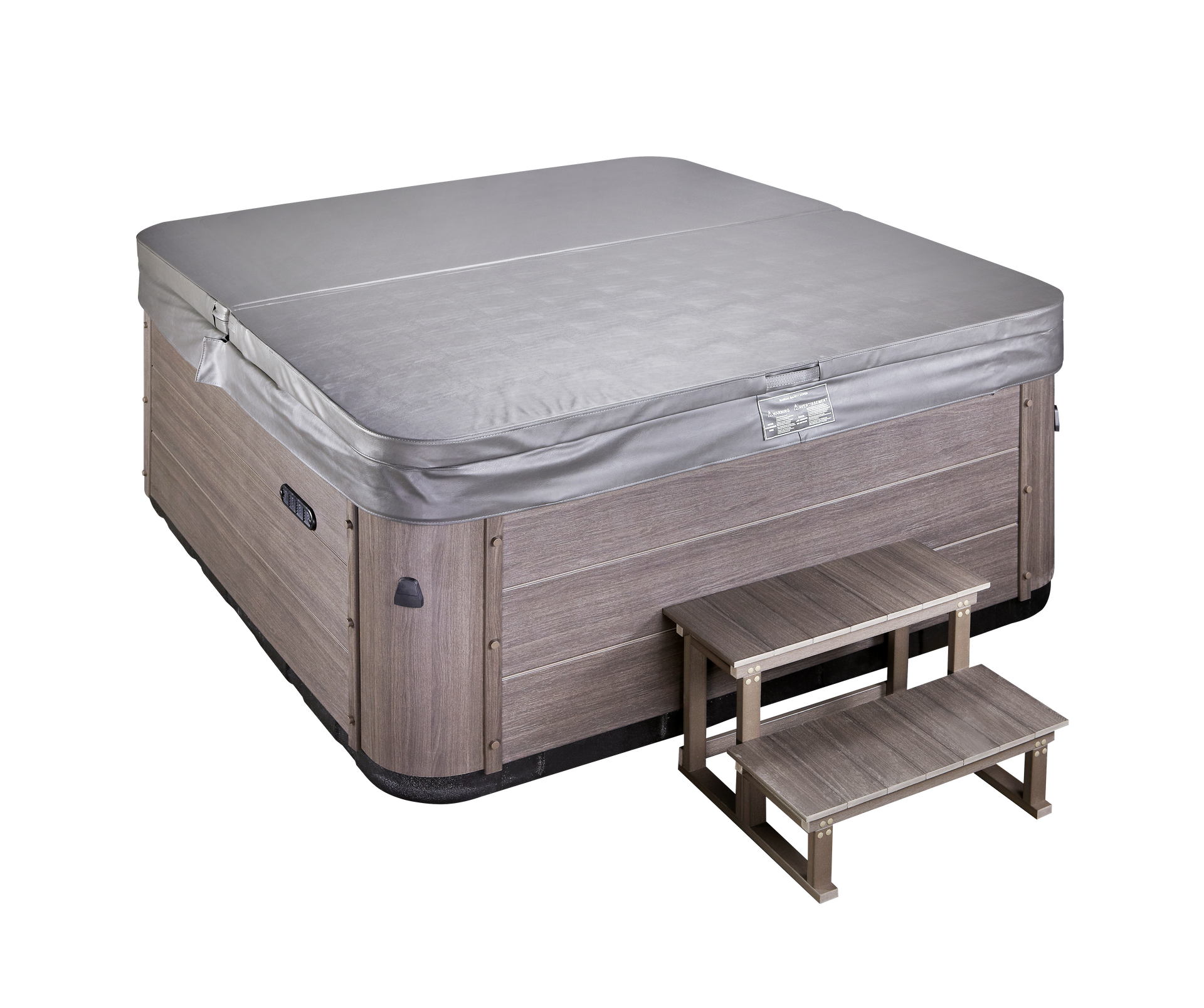 Hot tub with closed gray cover, wooden steps on side.