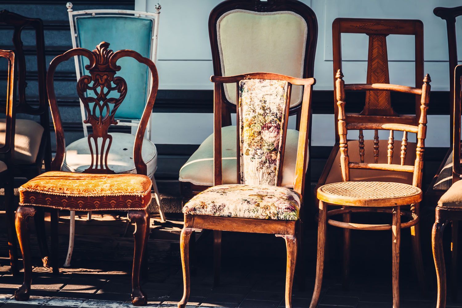 A group of chairs are lined up in a row.
