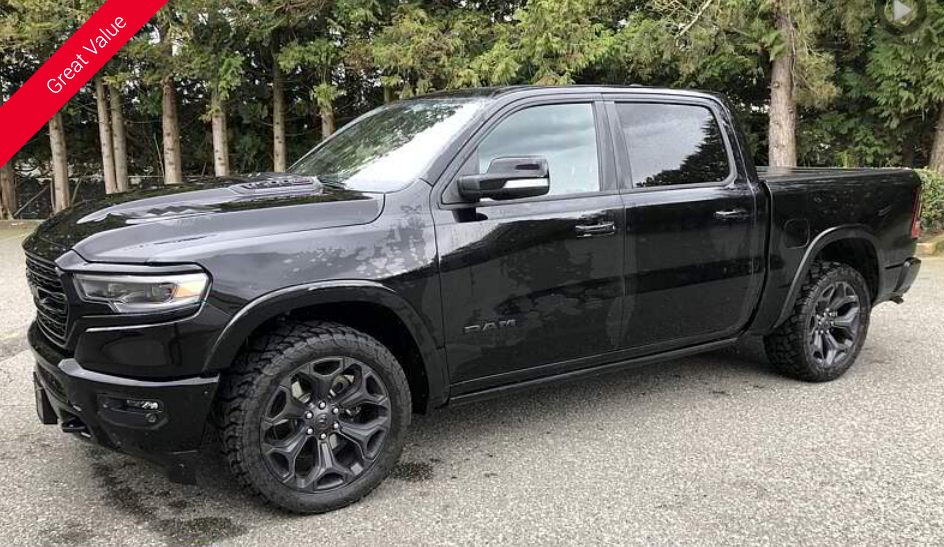 Black Ram truck parked outdoors.
