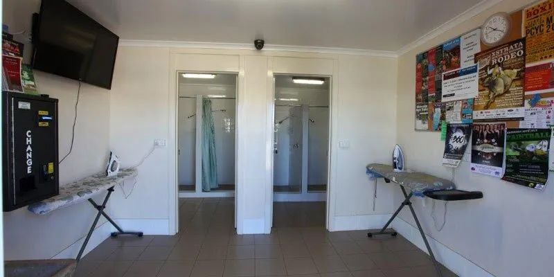 A Room With A Tv, Ironing Board, And Ironing Board — Leichhardt Accommodation in Mornington, QLD