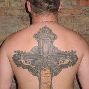 A man has a cross tattoo on his back.