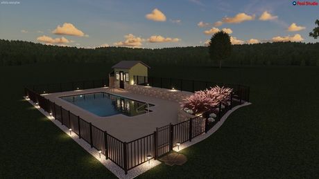 Modern house with a large lit terrace, swimming pool, and surrounding trees at dusk