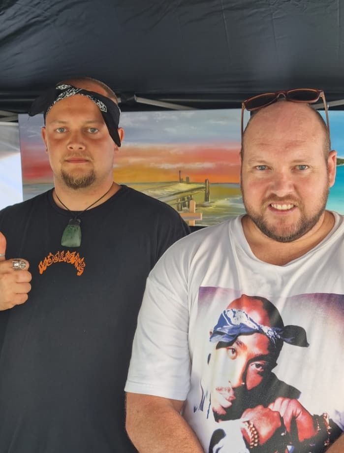 Two Men Are Standing Next To Each Other — Unique Life Services In Nelson Bay, NSW