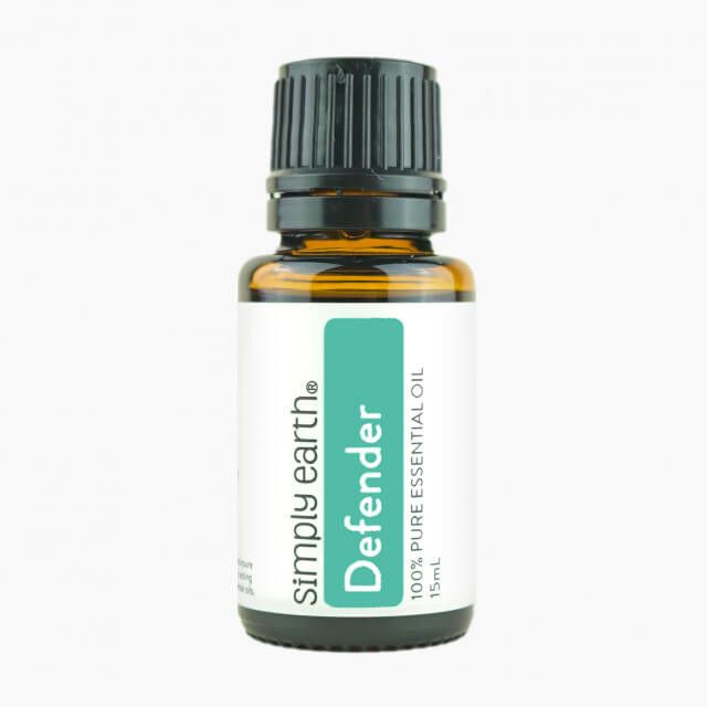 A bottle of simply earth defender essential oil